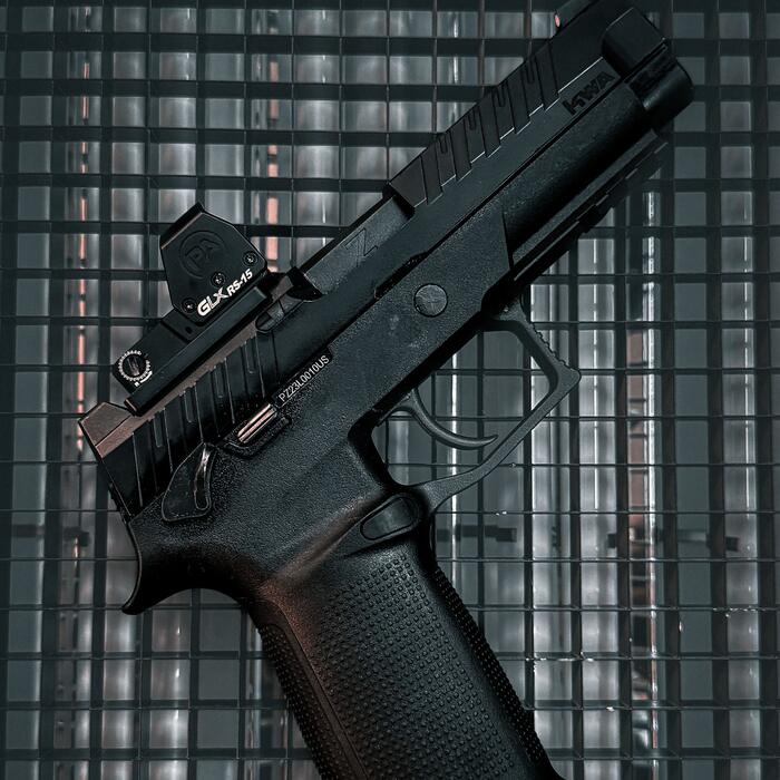 KWA gas blowback pistol on dark background