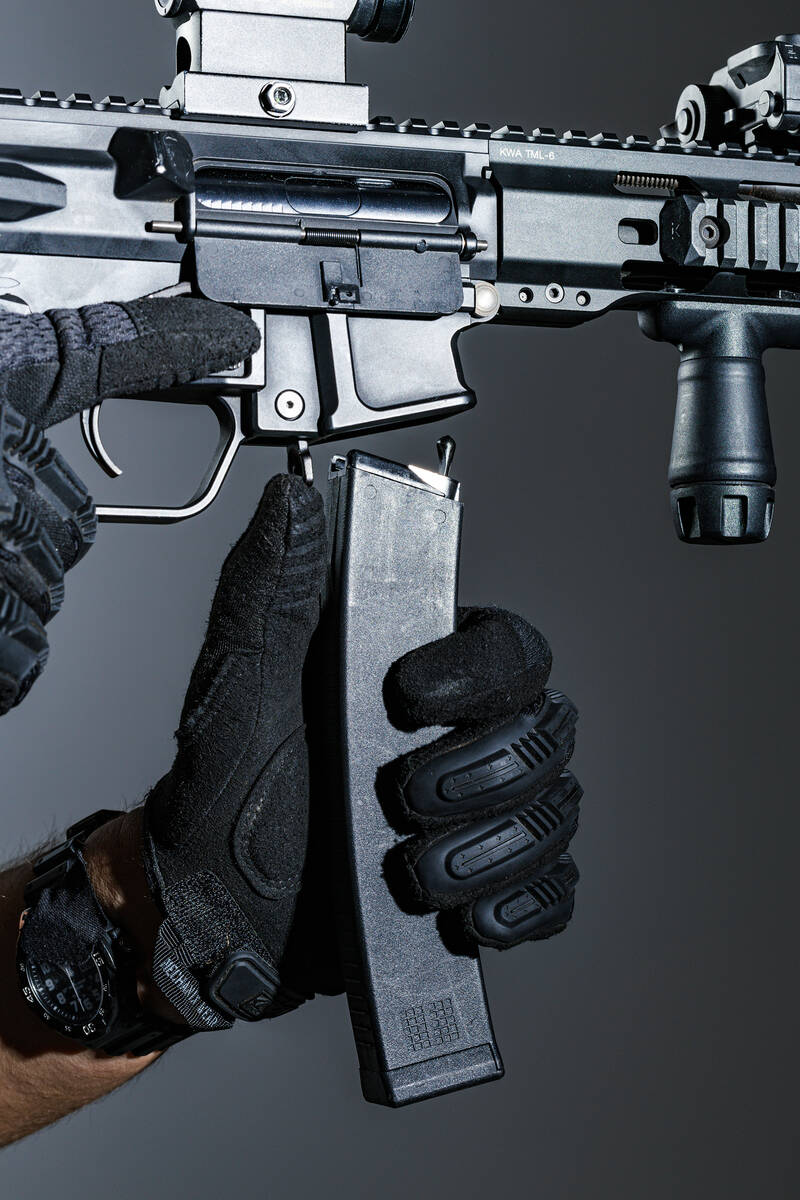 Loading an airsoft magazine